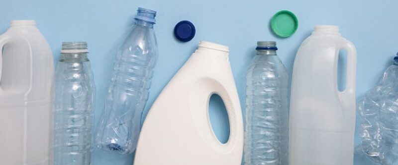 Top view of rubbish for recycling on a blue background