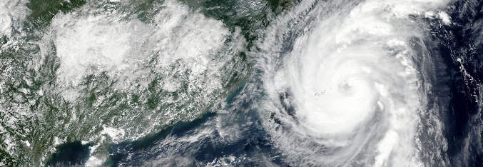 Typhoons Talim and Doksuri. Elements of this image furnished by NASA.