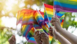 LGBT pride or LGBTQ+ gay pride with rainbow flag for lesbian, ga