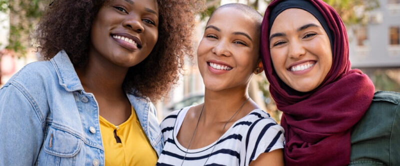Multiethnic young friends enjoying together